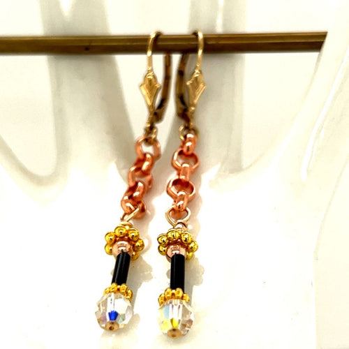Golden lever bcks with copper chain, rose gold filled accents, gold Bali and sparkly crystals.