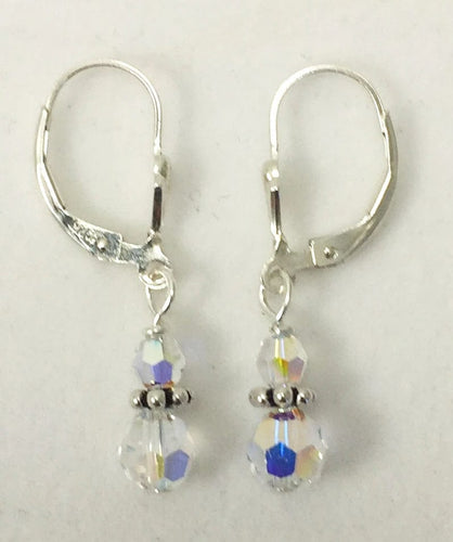 Sterling lever back earrings with two sizes of sparkly crystals and Bali silver in between.